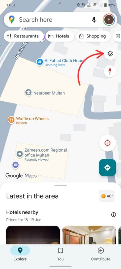 Tap the Layers button (usually in the top-right corner). 